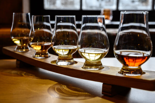 Scotch whisky, tasting glasses with variety of single malts or b